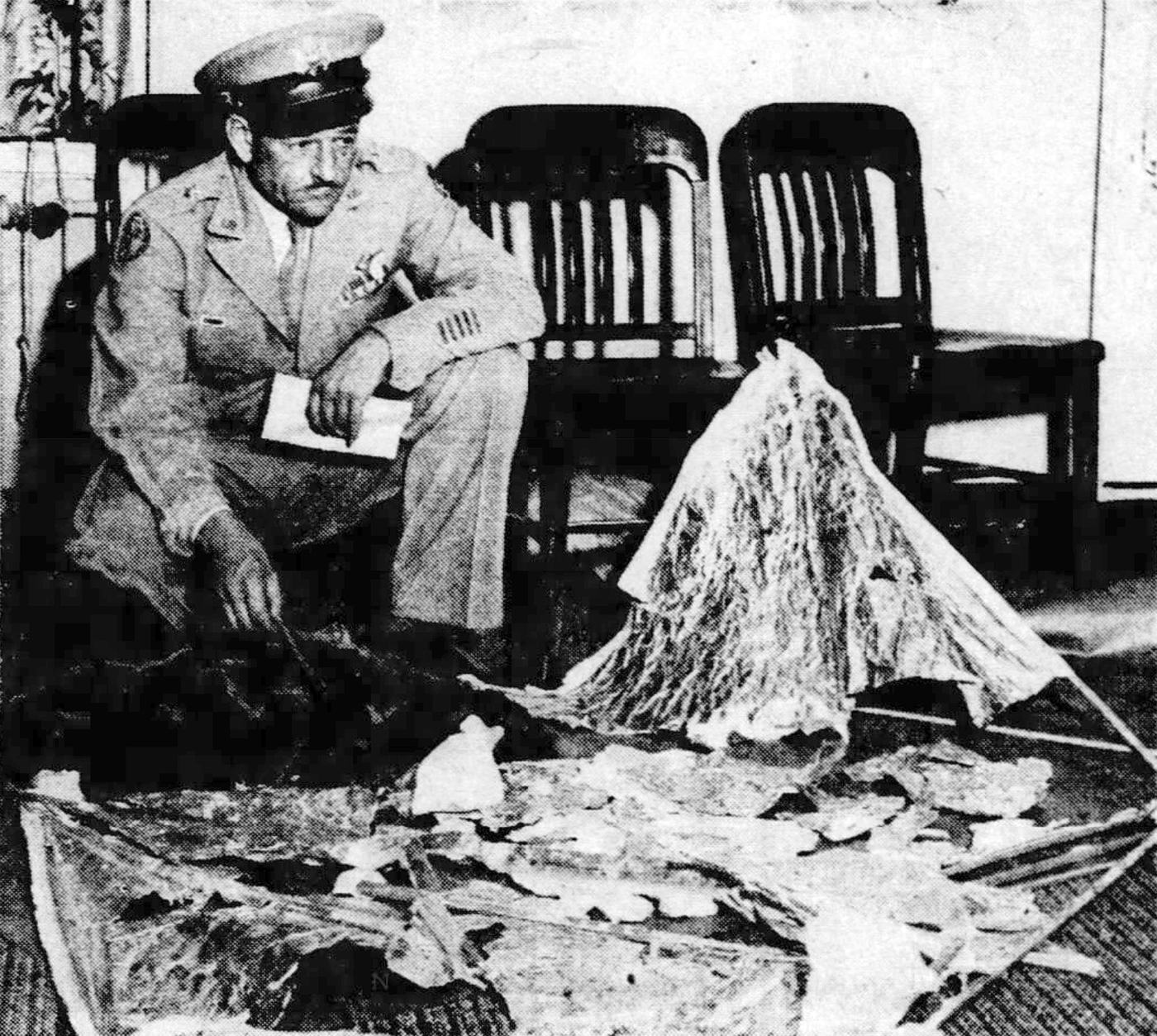 Brig. Gen. Roger Ramey with the debris, Fort Worth, 8 July 1947 (Fort Worth Star-Telegram)